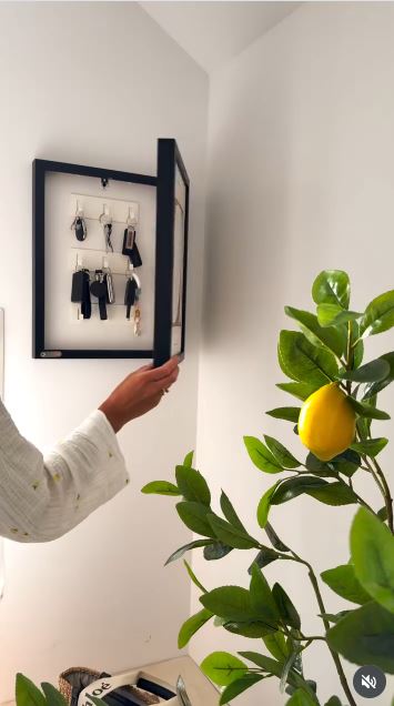 Hide Everyday Clutter Behind Framed Artwork