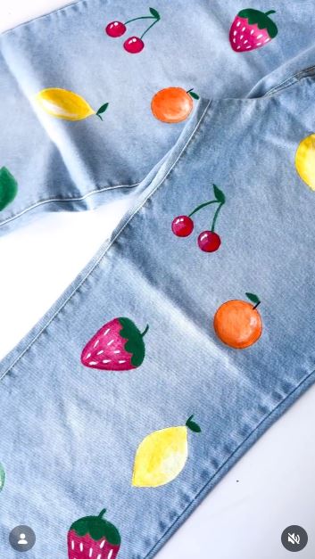 Paint Small Fruit Across Faded Jeans