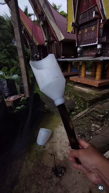 Cut a Small Garden Scoop From a Handled Bottle Shape