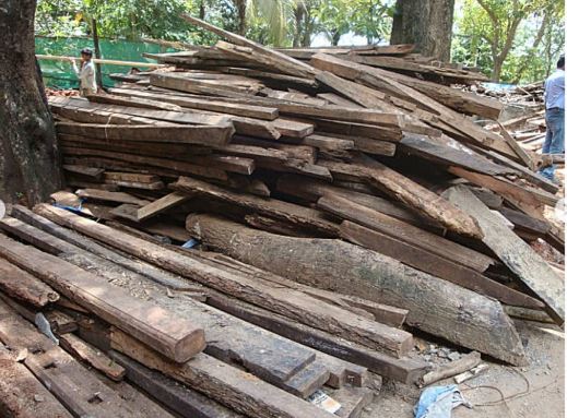 Inspect Reclaimed Rafters and Remove Old Nails Inspect Reclaimed Rafters and Remove Old Nails